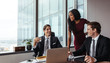 © Jacob Lund - Businesspeople having a casual talk in office