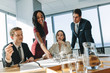 © Jacob Lund - Corporate professionals during meeting in board room