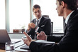 © Jacob Lund - Corporate professionals having discussion in office
