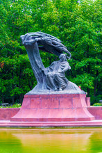 Bronze Statue Of Fryderyk Chopin By Waclaw Szymanowski In Royal Lazienki Park ( Lazienki Królewskie) Warsaw
