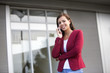 © BGStock72 - Young businesswoman in red blazer talking over the mobile phone