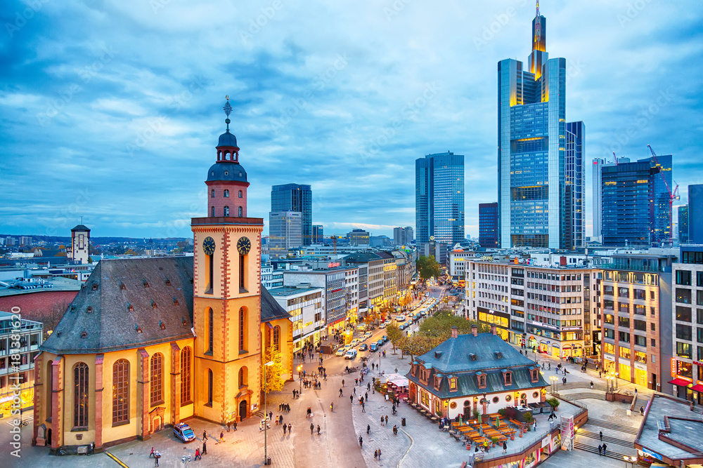 View to skyline of Frankfurt in sunset blue hour. St Paul's Church and the Hauptwache Main Guard building at Frankfurt central street Zeil. - obrazy, fototapety, plakaty 