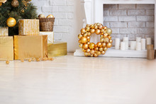 Photo Of Luxury Gift Boxes Under Christmas Tree, New Year Home Decorations, Golden Wrapping Of Santa Presents, Festive Tree Decorated With Garland, Baubles, Traditional Celebration. Copy Space