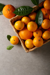 Wall Mural - Fresh oranges in box on concrete