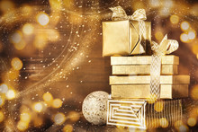 Shiny Gold Boxes With Christmas Presents