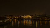 Fototapeta Miasto - View in autumn night Prague near Vltava river