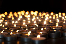Tealight Candles. Beautiful Christmas Celebration, Religious Or Remembrance Candlelight Image. Romantic Candlelit Vigil