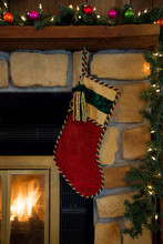 Christmas Red Corduroy Stocking Hanging On Fireplace
