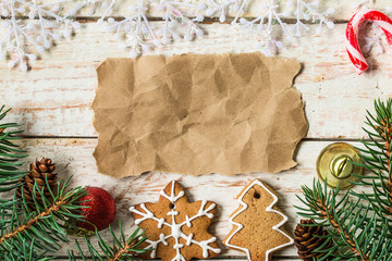 Christmas decoration with paper sheet on table