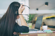 © I Believe I Can Fly - modern business woman at workplace tired and worried in office