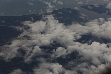 Wall Mural - Sunset White Cloud sky at high level attitude, view from window airplane