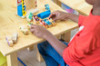 © weedezign - Black American kid play car toy at classroom in kindergarten preschool,Education concept.