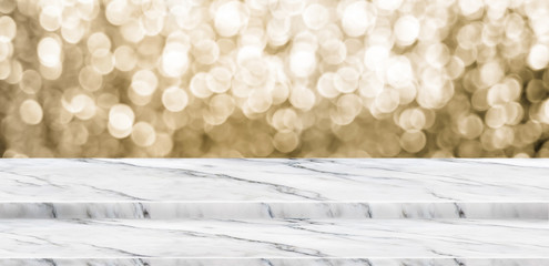 Wall Mural - Empty marble step table stand with blur abstract sparkle gold background bokeh light,Mock up for display or montage of product,Banner or header for advertise on online media,Holiday celebrate concept.