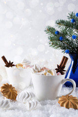 Wall Mural - Holiday cup of  cocoa with marshmallow or coffee with spice and home cookies. Christmas background.