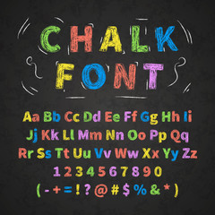 colorful retro hand drawn alphabet letters drawing with chalk on black chalkboard