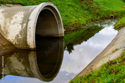 Fotografia, Obraz Concrete culvert pipe hole system draining sewage water
