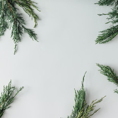 Wall Mural - Creative Chistmas layout made of winter greenery decoration. Flat lay. Holiday season concept.