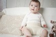 © Irina - A small child in natural tissue diapers, eco-friendly cotton diapers
