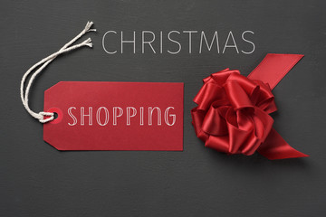 Sticker - red gift bow and text chrismtas shopping