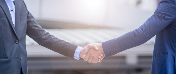 handshake of business People Teamwork Meeting .two businessman Hold hand and shake hand in city