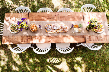 Table set for a garden party or celebration outside.