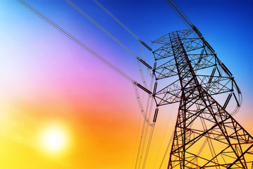 Wall Mural - high voltage post or high voltage tower at sunset