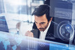 © SFIO CRACHO - Concept of digital diagram,graph interfaces,virtual screen,connections icon.Young entrepreneur working at modern office.Blurred background.Horizontal.
