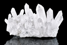 Pure Quartz Crystal Cluster Isolated On Black Background. Natural Translucent Crystal Stone Surface Macro Closeup. Macro Of Beautiful Rare Mineral Stone