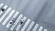 The From The Top Crosswise View Of People Walk On Street Pedestrian Crossroad In The City Street ,bird Eye View.