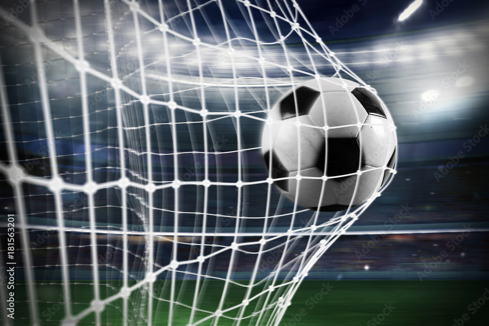 Soccer ball scores a goal on the net - obrazy, fototapety, plakaty 