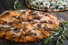 Pizza With Mushrooms And Cheese On Thin Dough