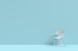 © justyle - White modern arm chair in mint blue living room with free copy space. minimal style concept.