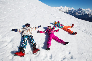 Wall Mural - small children in ski resort