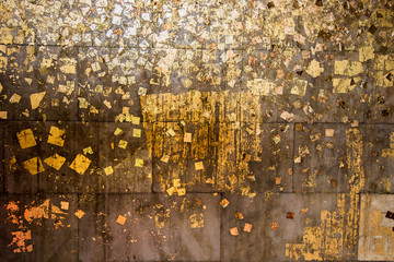 Wall with gold plate in the temple