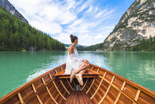 Side view of woman traveling by boat in Pragser Wildsee lake