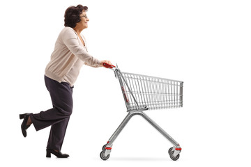 Poster - Elderly woman running and pushing an empty shopping cart