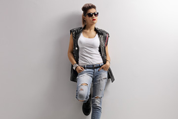 Wall Mural - Punk girl with a pair of sunglasses