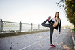 © AS Photo Family - Young girl has the training and doing exercise outdoors. Sport, fitness, street workout concept.