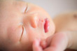 © WONG SZE FEI - Close up Asian new born baby sleeping