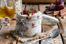 Overnight Oatmeal In A Jar With Cherry Jam And Chocolate
