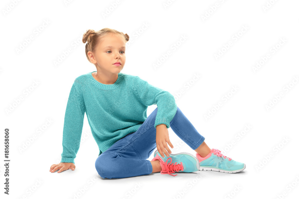 Little fashionable girl on white background