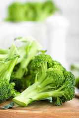 Canvas Print - Fresh broccoli on white background closeup