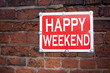 © Artur - Hand writing text caption inspiration showing Happy Weekend concept meaning Holiday Day Off Celebration written on old announcement road sign with background and copy space