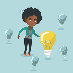 Canvas Print - Young african business woman standing among unlit idea light bulbs and touching the brightest idea bulb. Concept of creative successful business idea. Vector cartoon illustration. Square layout.