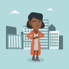 Sticker - Young african-american business woman standing on the background of city business buildings and taking off her coat like a superhero