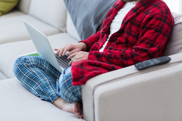 Wall Mural - man freelancer in bathrobe working from home