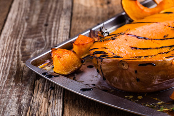 Wall Mural - Roasted pumpkin with thyme and balsamic glaze on top