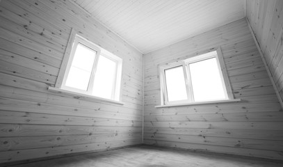 Windows in empty room, wooden interior