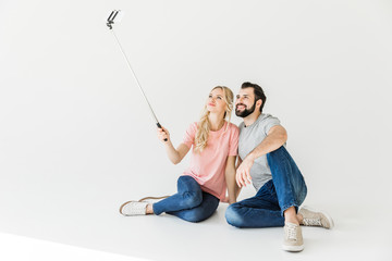 Wall Mural - couple taking selfie with smartphone