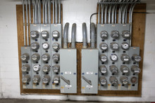 A Gaggle Of Electric Meters In The Basement For An Apartment Building. St Paul Minnesota MN USA